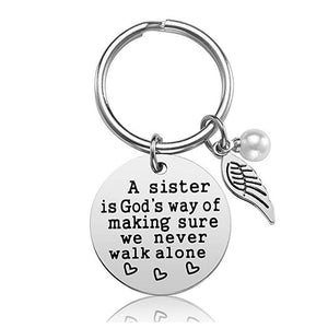 A Sister is God's Way of Making Sure We Never Walk Alone Key Chain
