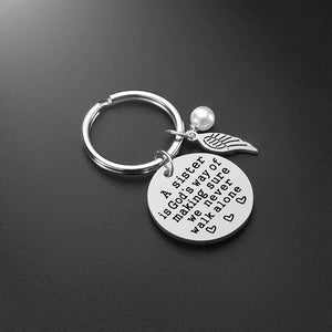 A Sister is God's Way of Making Sure We Never Walk Alone Key Chain